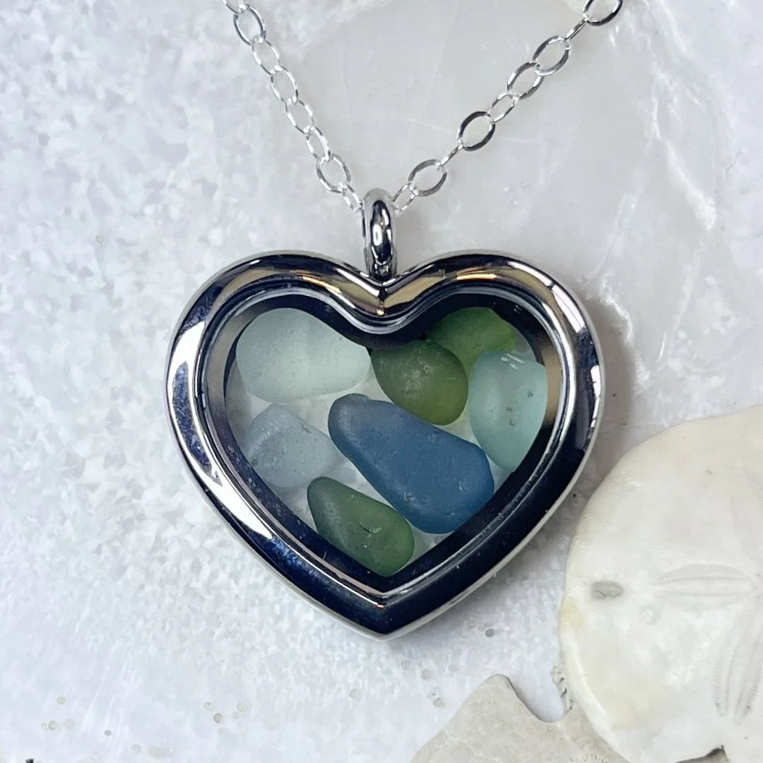 Glass Heart Locket Filled with Shades of Blue and Green Sea Glass.jpg