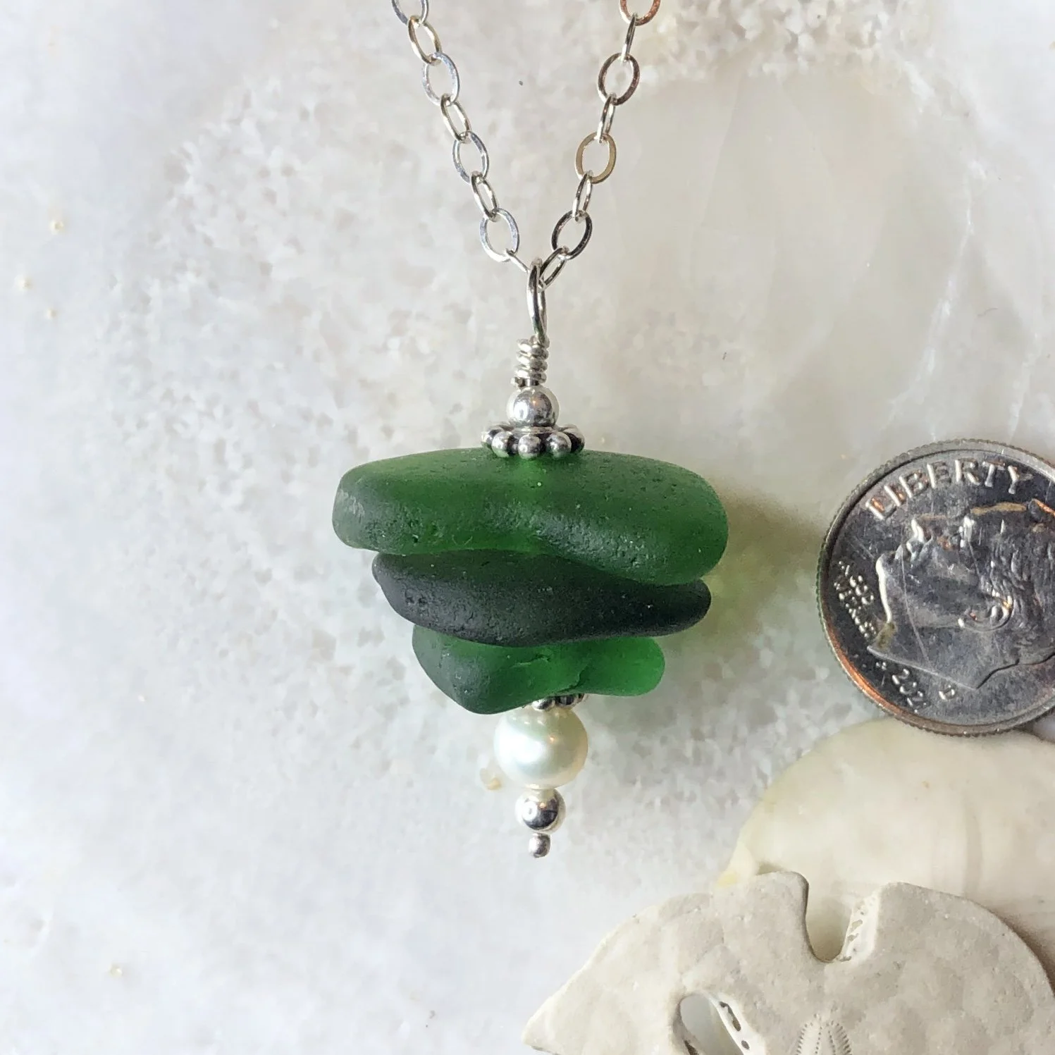 Stacked green sea glass necklace with a freshwater pearl