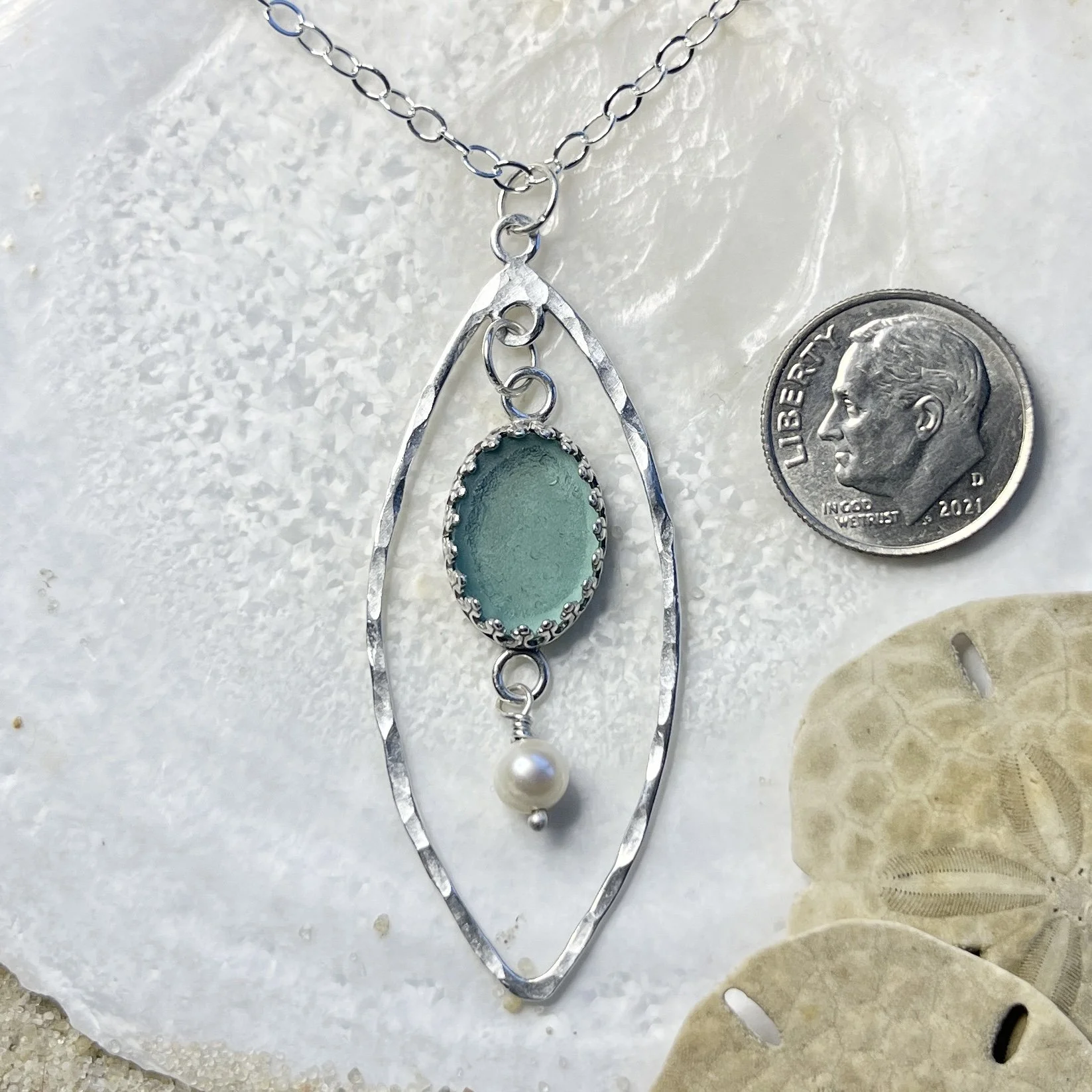 Light teal Sea Glass Pendant with a Fresh Water Pearl in a Sterling Silver Frame.jpg