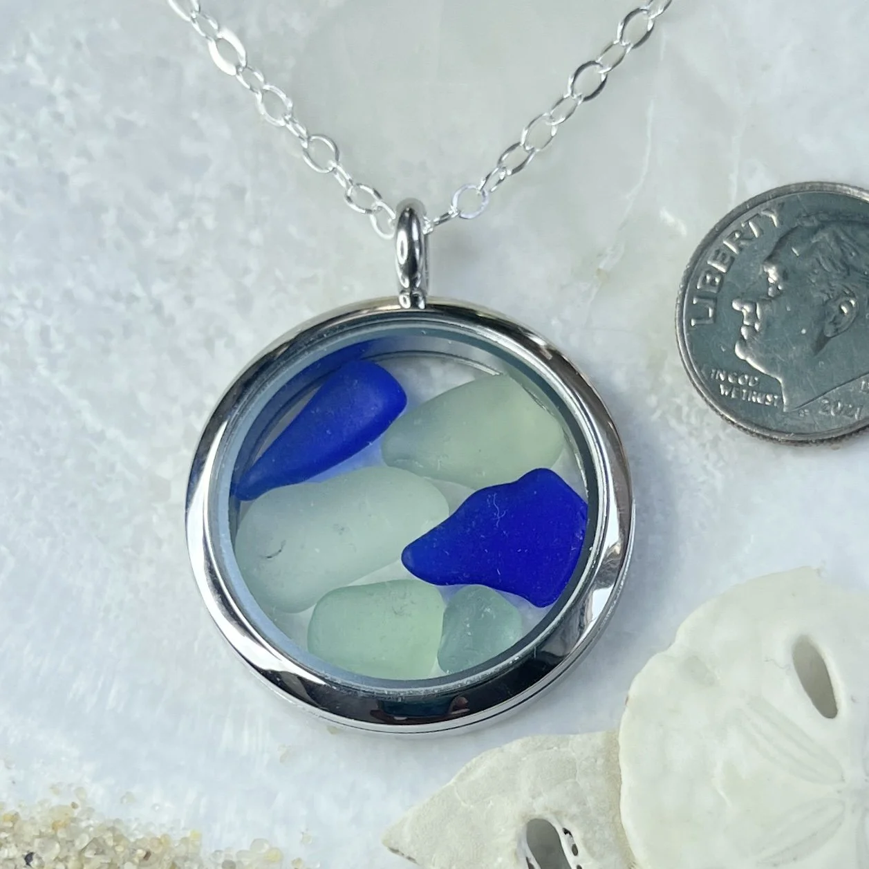Glass Circle Locket Filled with Cobalt Blue and Seafoam Sea Glass.jpg