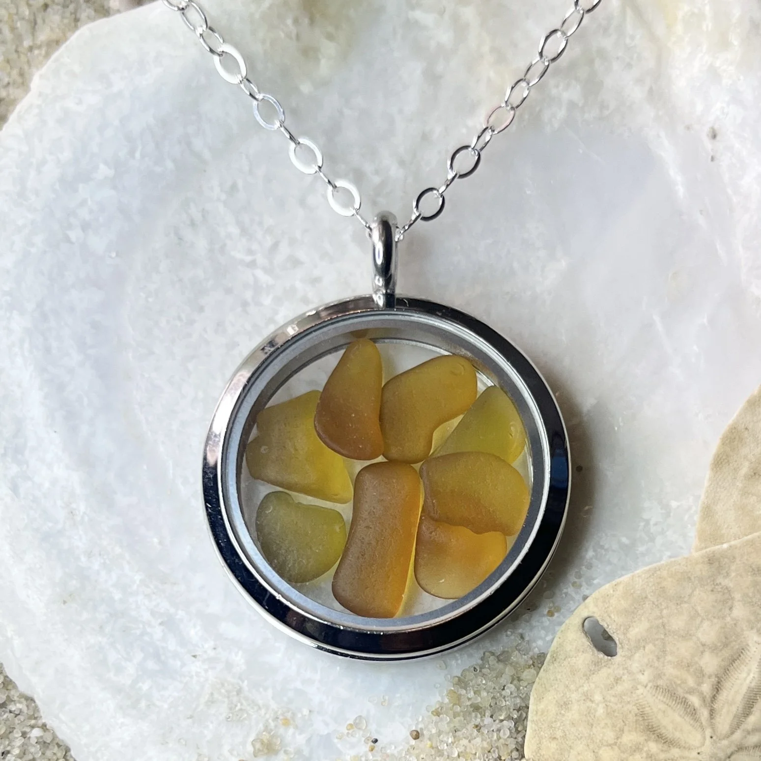 Glass Circle Locket Filled with Shades of Honey Colored Sea Glass by Janet Payne Jewelry, Cape May, NJ.jpg
