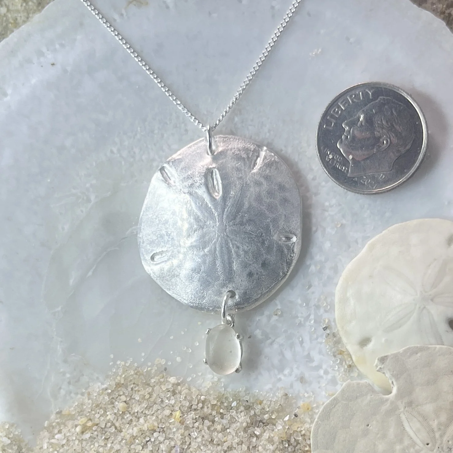 Fine Silver Sand Dollar Pendant with a Cape May Diamond Drop