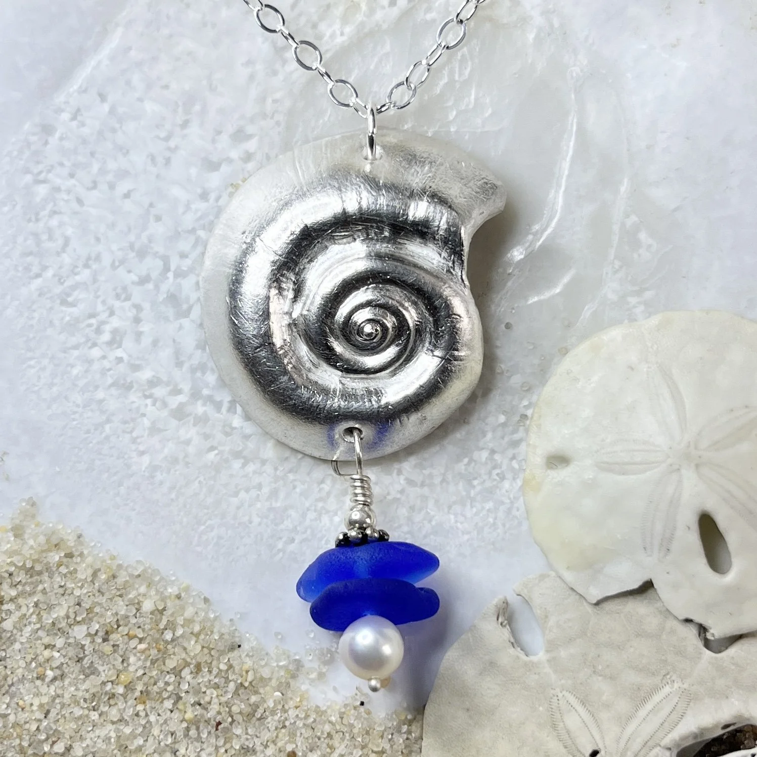 Fine Silver Shell Pendant with a Cobalt Blue Sea Glass Drop with a Freshwater Pearl by Janet Payne Jewelry, Cape May, NJ.jpg