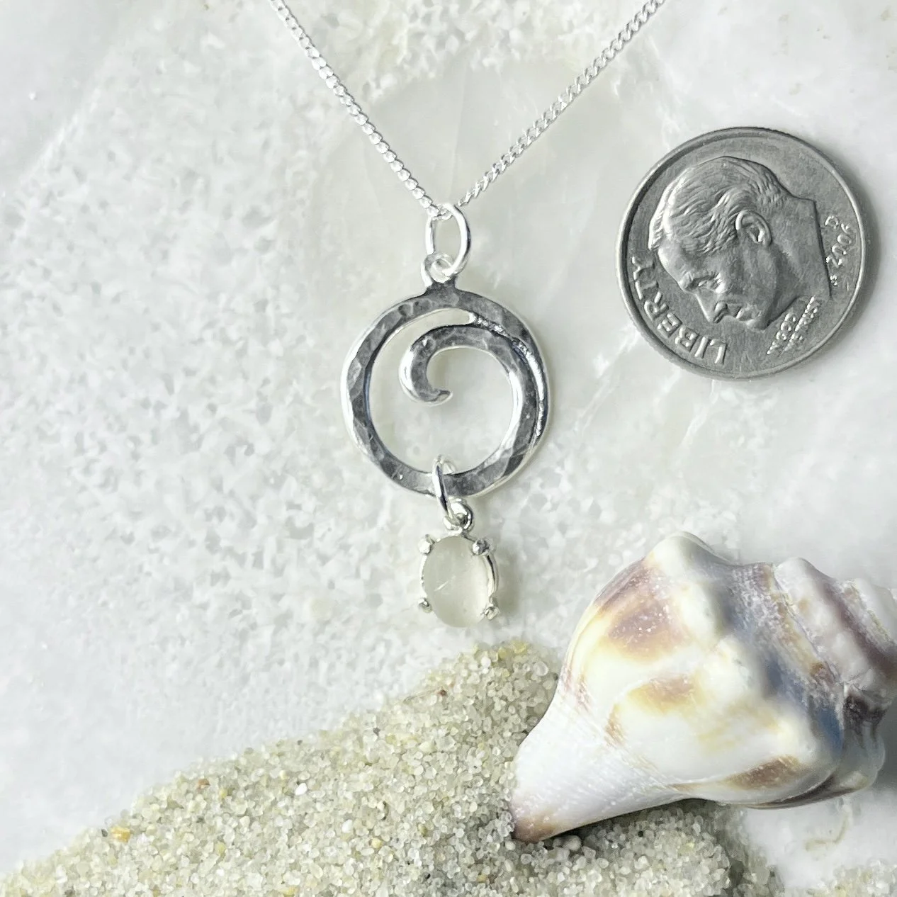 Sterling Silver Ocean Wave with a Natural Cape May Diamond Drop
