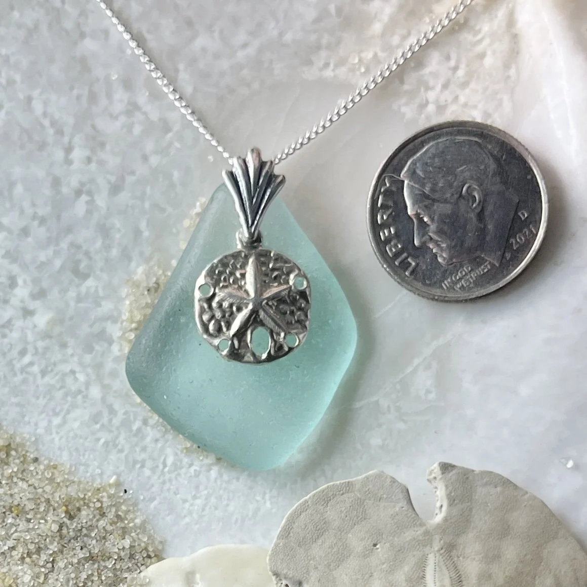 Blue Seafoam Sea Glass Necklace with a Sterling Silver Sand Dollar