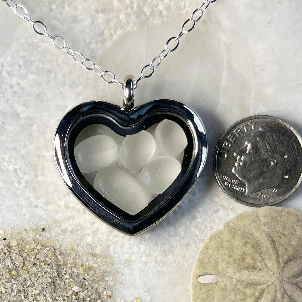 Glass Heart Locket Filled with Cape May Diamonds .jpg