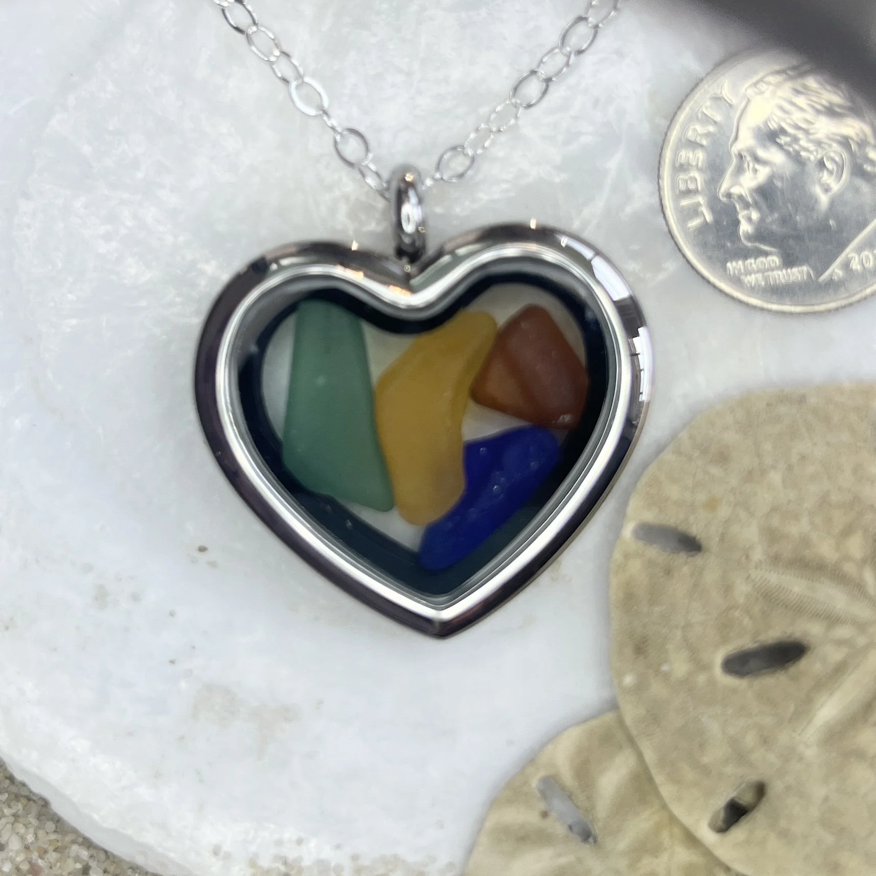 Glass Heart Locket Filled with Shades of Fall Sea Glass.jpg