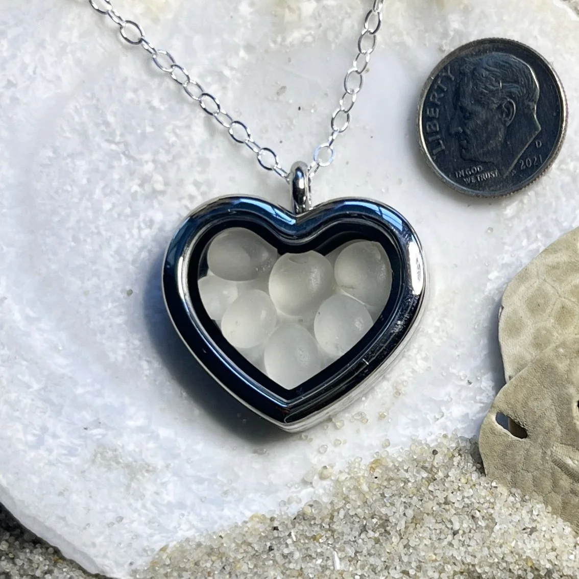 Glass Heart Locket Filled with Natural Cape May Diamonds.jpg