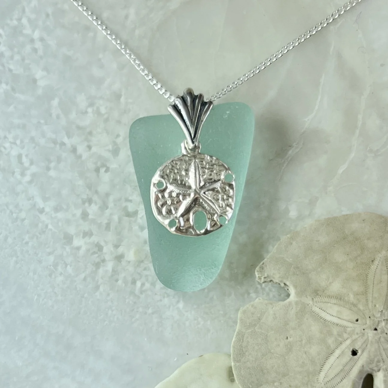 Blue Seafoam Sea Glass Necklace with a Sterling Silver Sand Dollar by Janet Payne Jewelry, Cape May, NJ.jpg