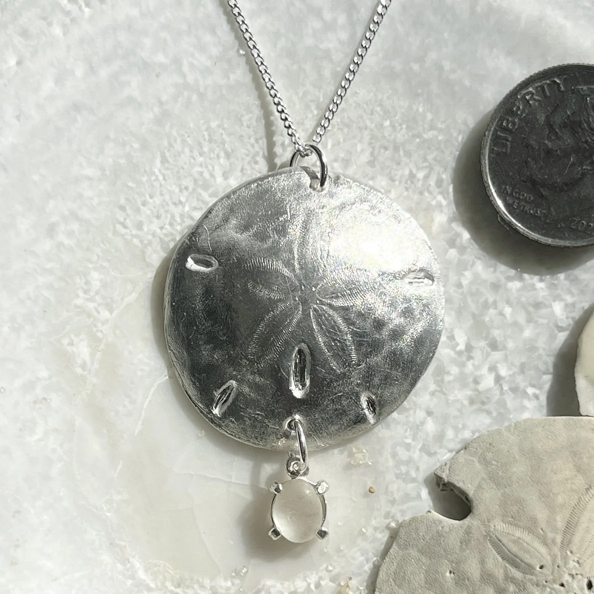 Fine Silver Sand Dollar Pendant with a Cape May Diamond Drop