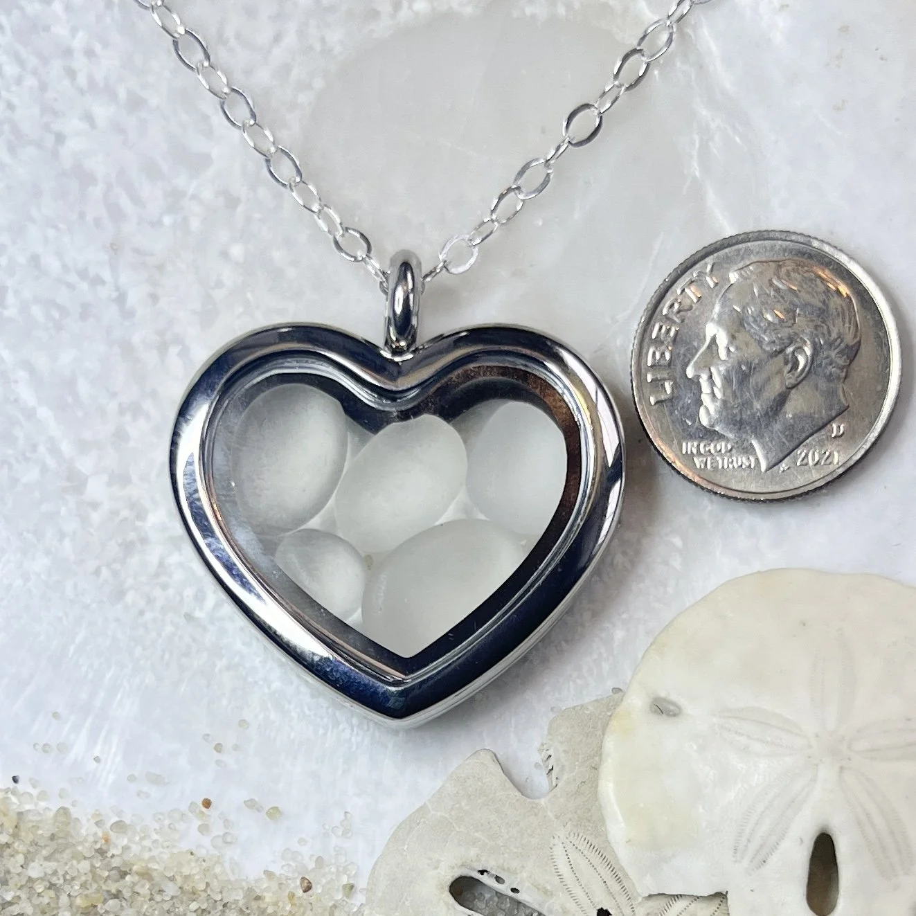 Glass Heart Locket Filled with Five Natural Cape May Diamonds.jpg