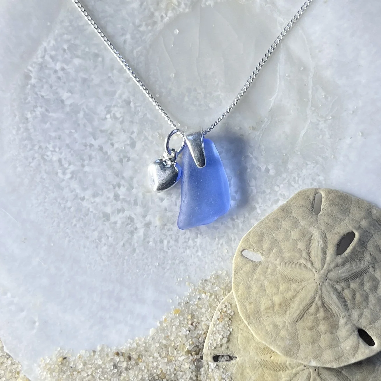 Petite Cornflower Blue Sea Glass Necklace with a Sterling Silver Heart.jpg
