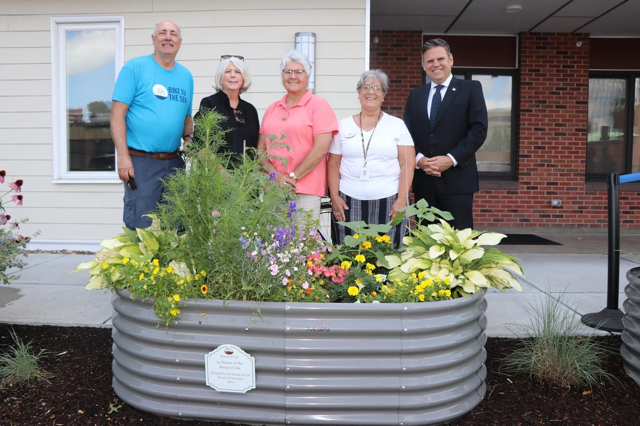 Bread of Life sponsors all 13 garden planters with support from mayor, city council