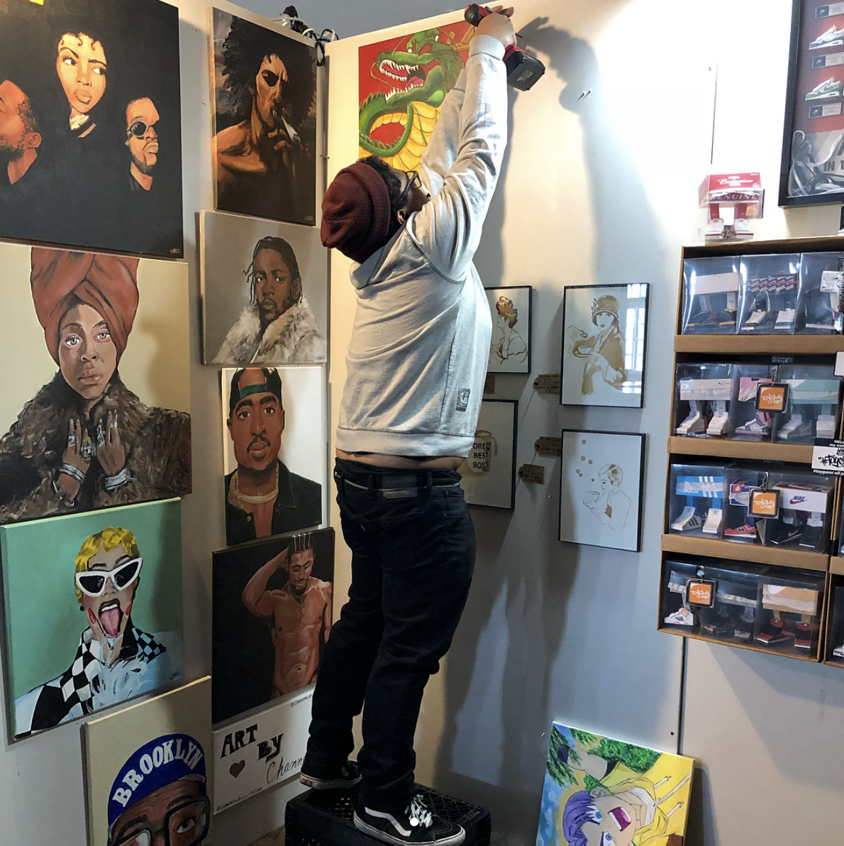 TP Got Juice features an eclectic mix of hip-hop and pop culture art. 