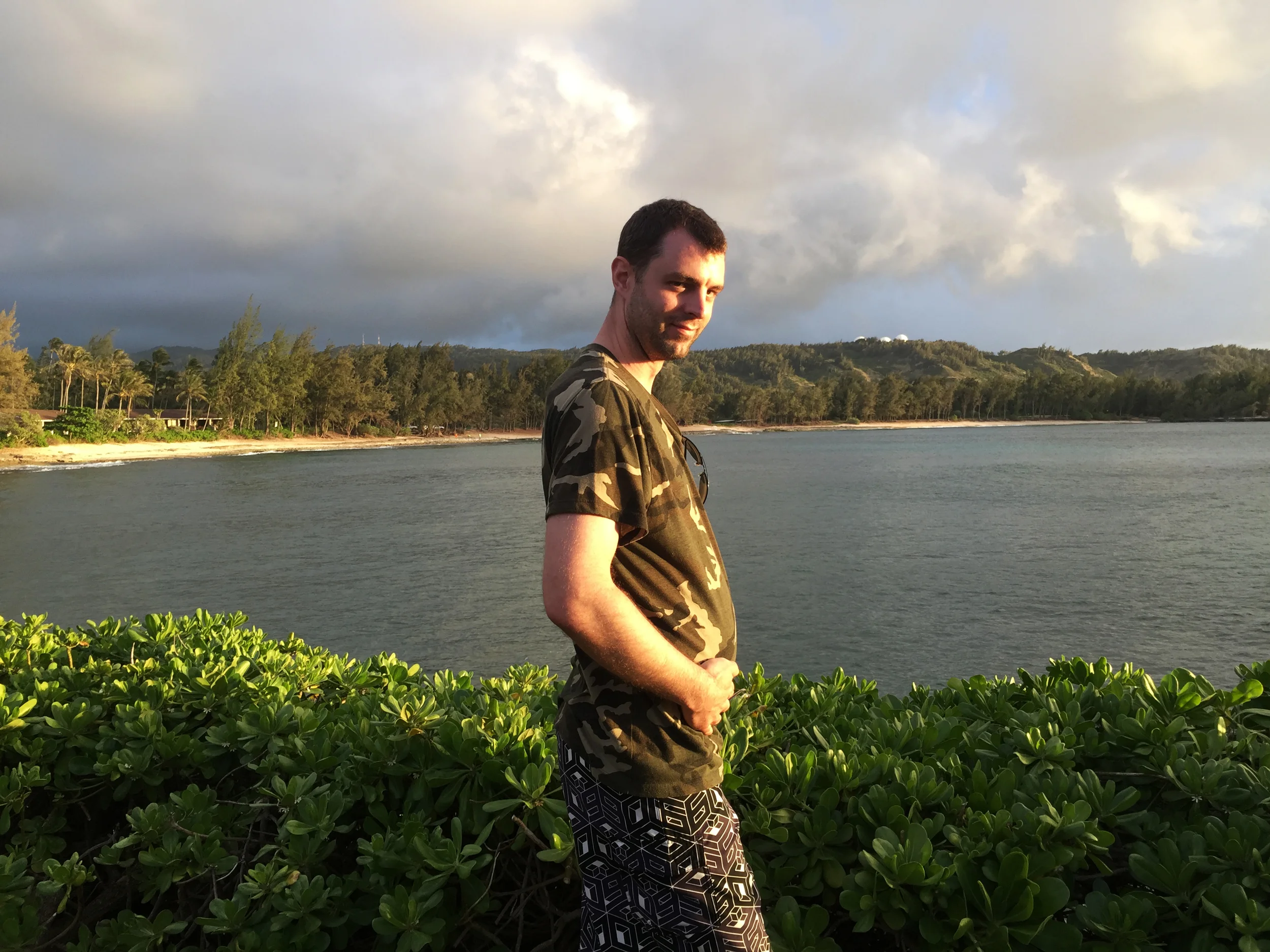  Showing off his baby bump. 