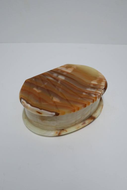 second, a hinged pearl shell shaped box made out of onyx for extra special treasures 