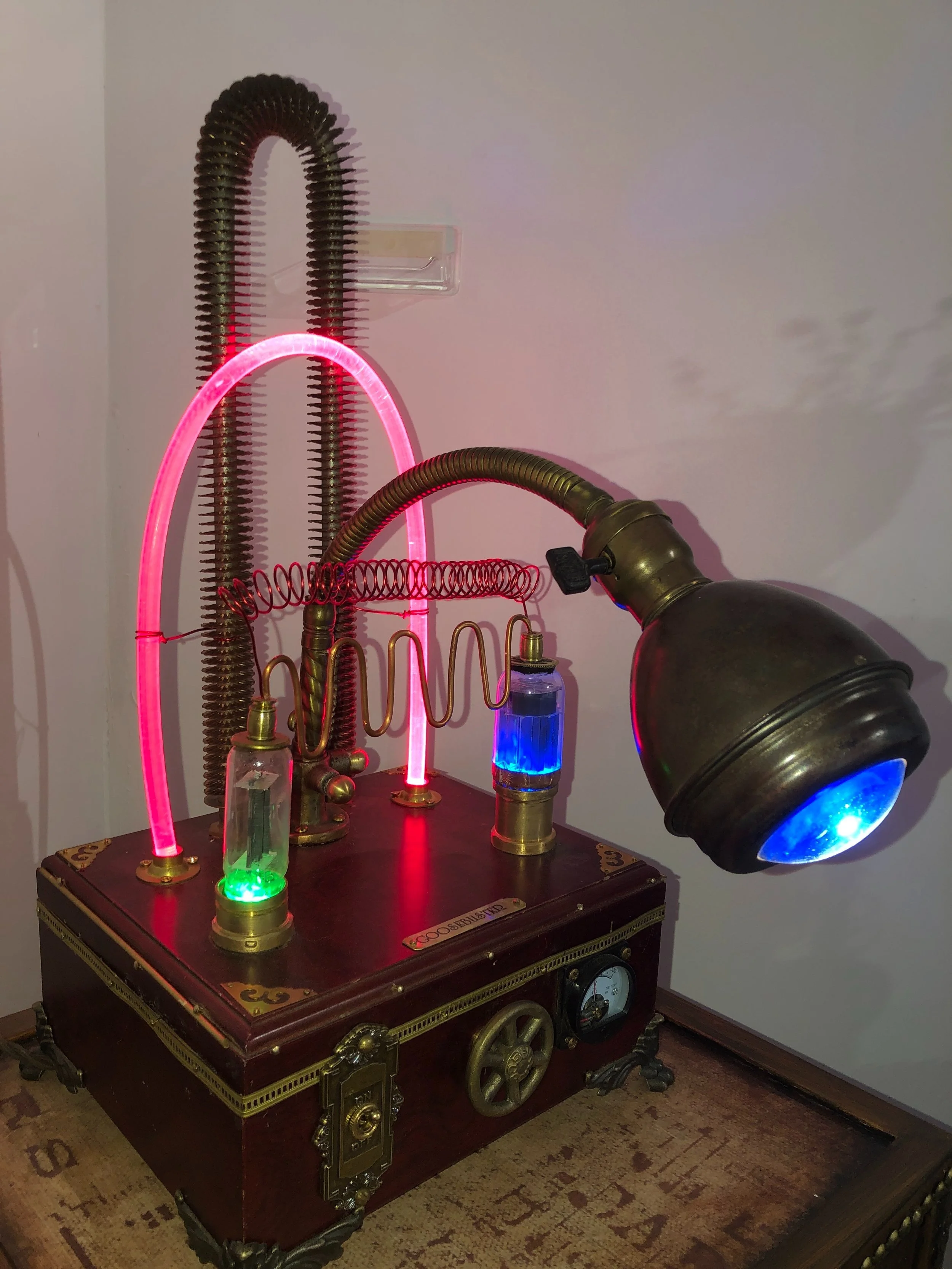 Goosebuster Desk Light         At Finer Arts Gallery