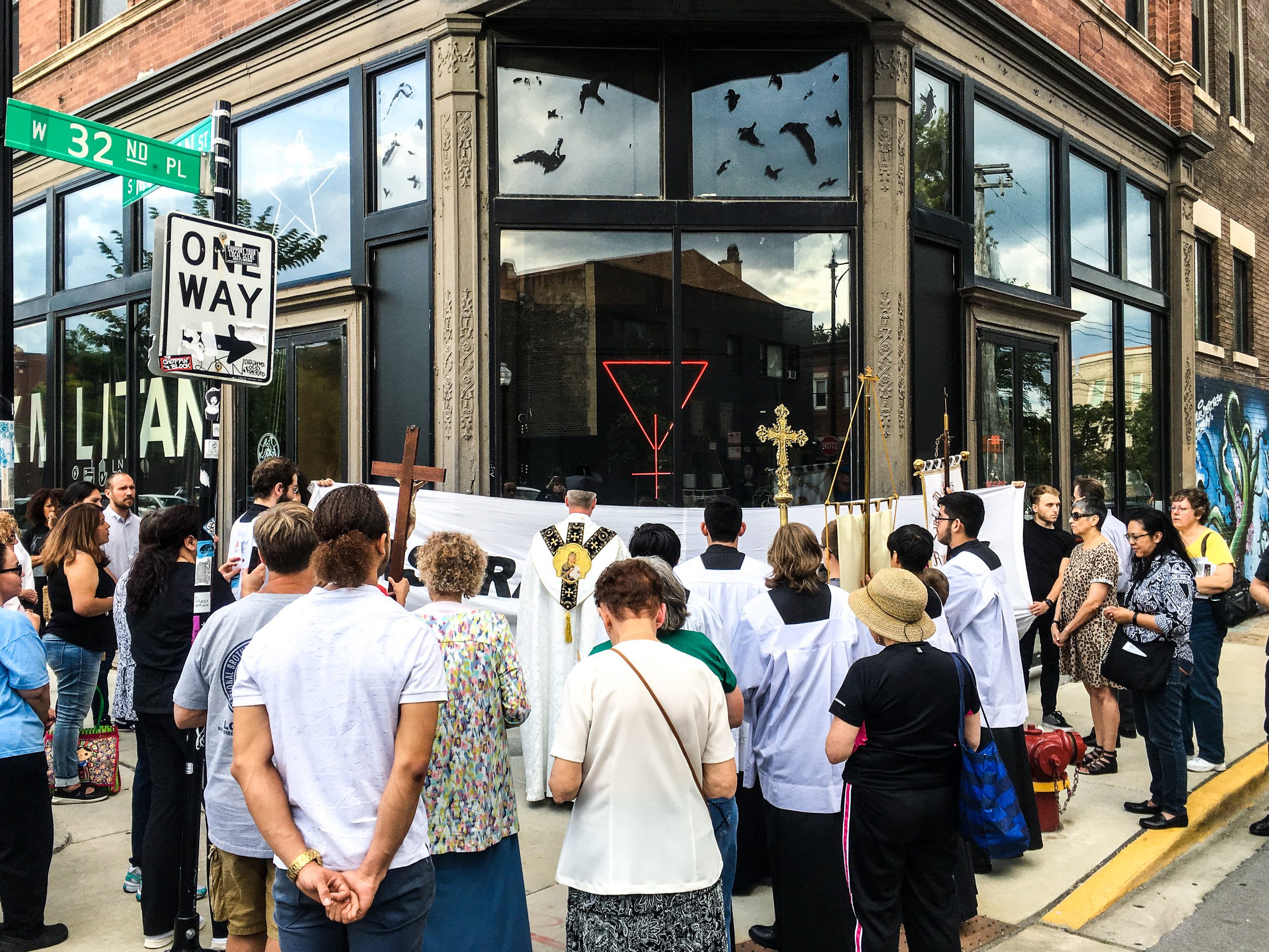 Catholic Church, unannounced protest. Photographer Leah Peacock.