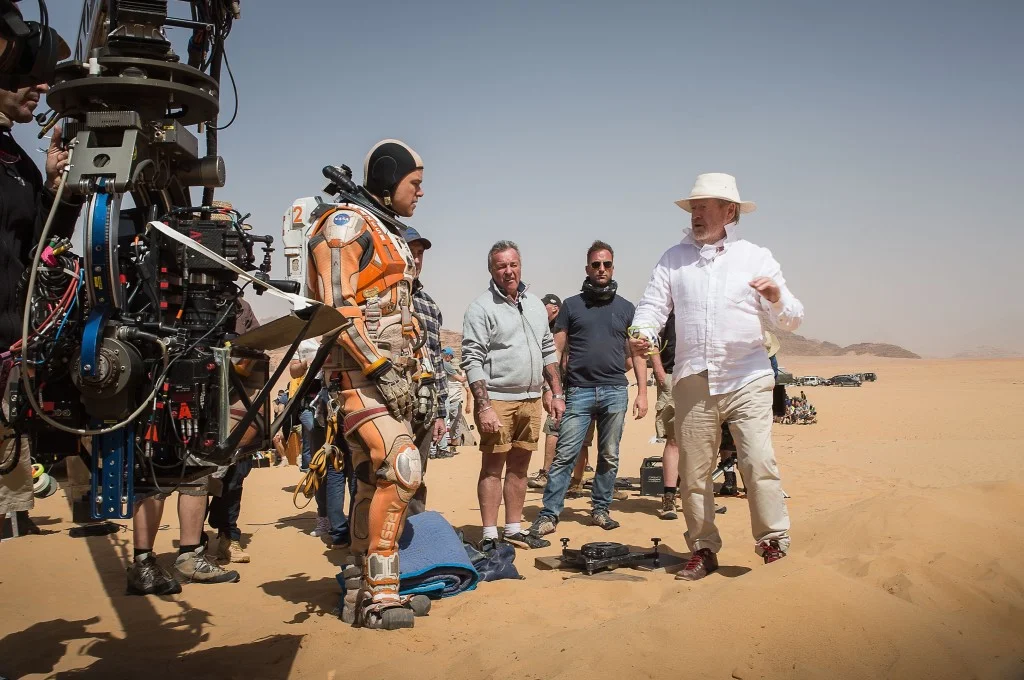 On location in Jordan, Ridley Scott directs Matt Damon, in THE MARTIAN.