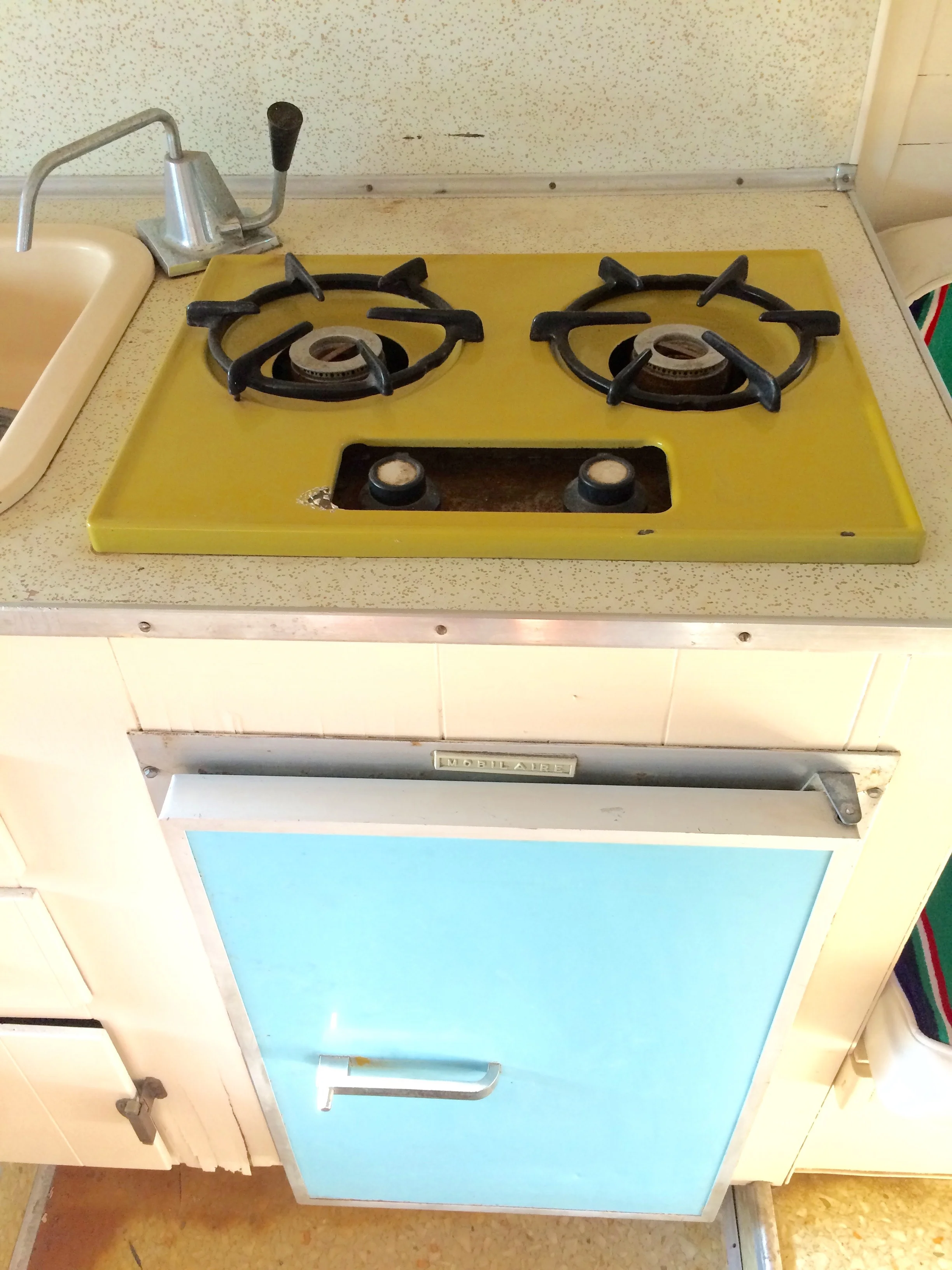 Icebox, stove and sink.