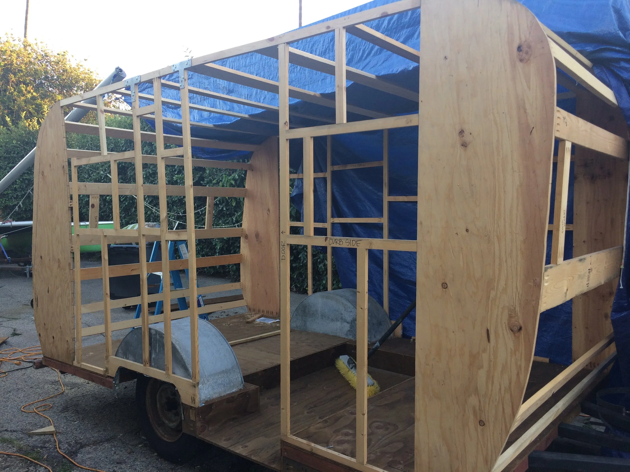 Framing completed! Please excuse the giant blue tarp. It's been raining like crazy here lately and we've rigged up quite an elaborate tent contraption that isn't very easy to remove for pictures