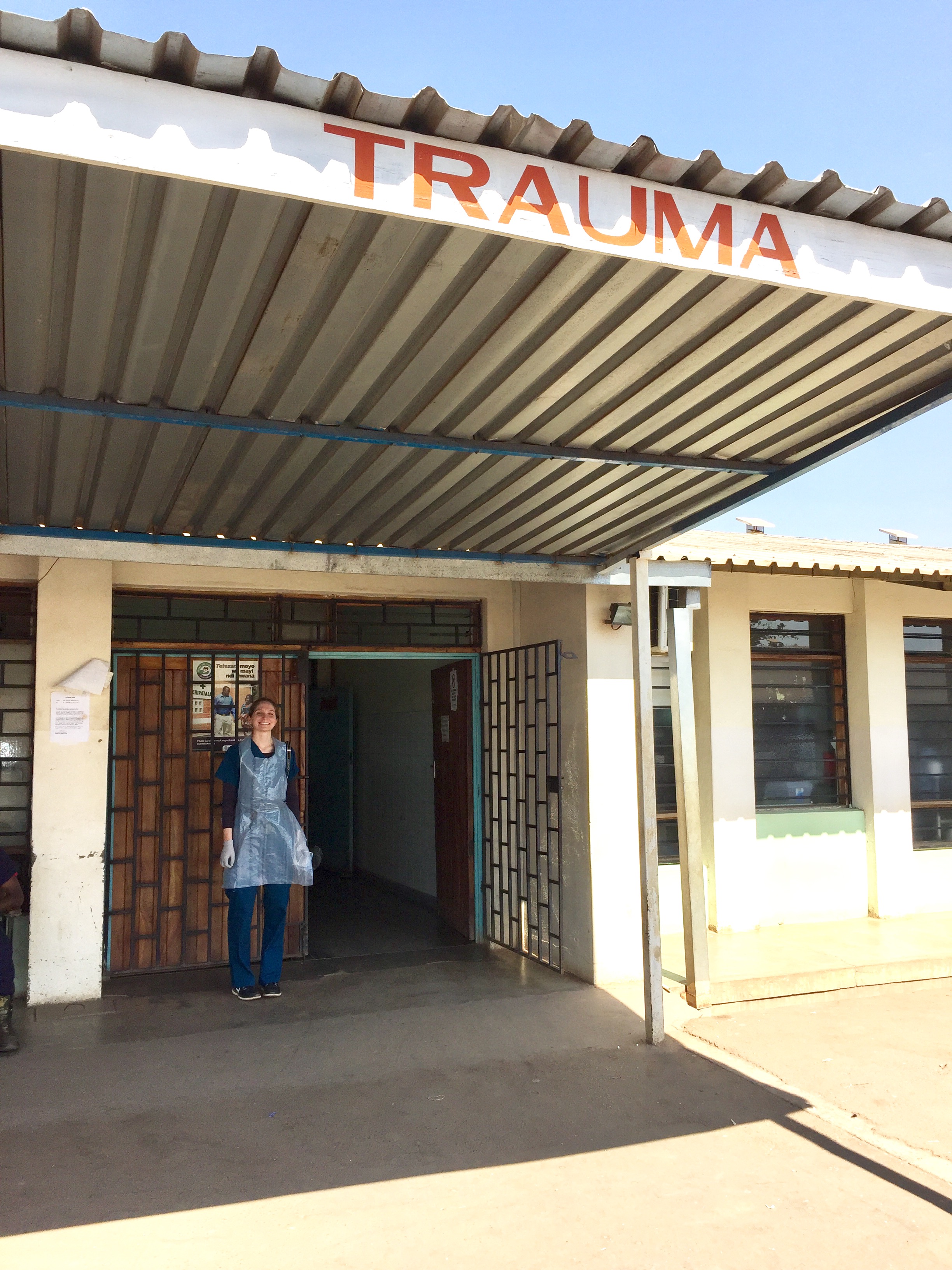 Lily stands outside of the Trauma unit at Kamuzu Central Hospital, July 2017.