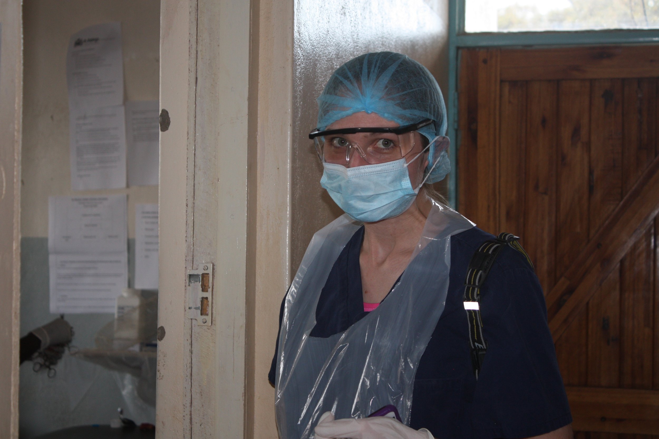 Lily outside of an operating room at Kabudula Hospital, July 2017