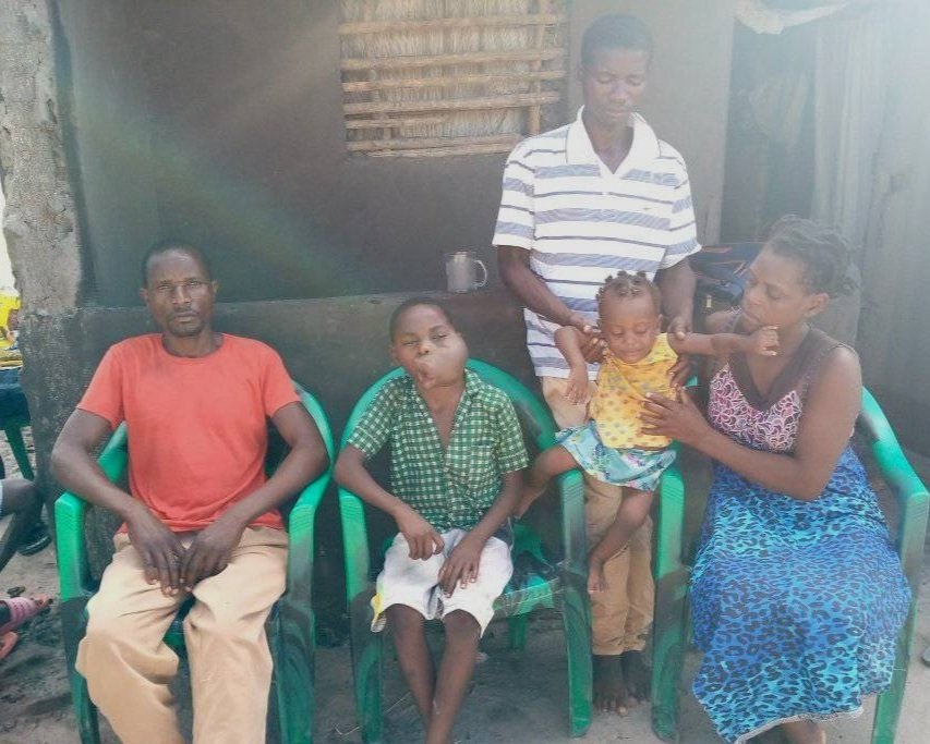 Mphatso with his father Alick, Helder, and Helder's wife and child