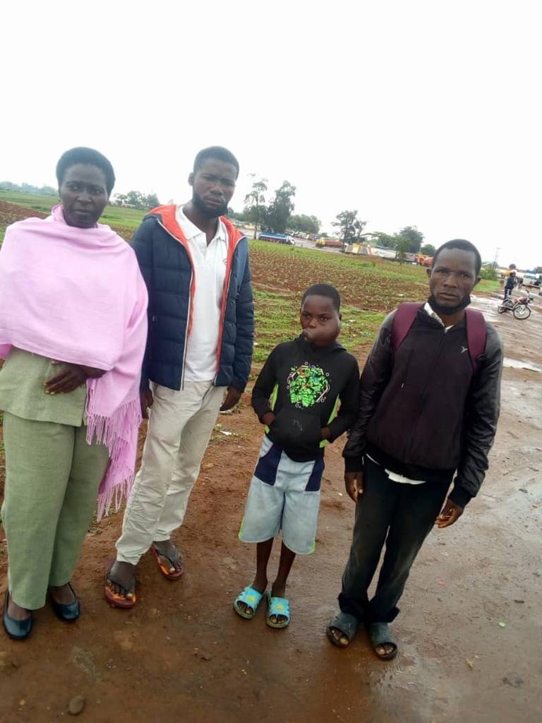 Nurse Christina, Helder, Mphatso, and Alick meet at the Mozambique-Malawi border