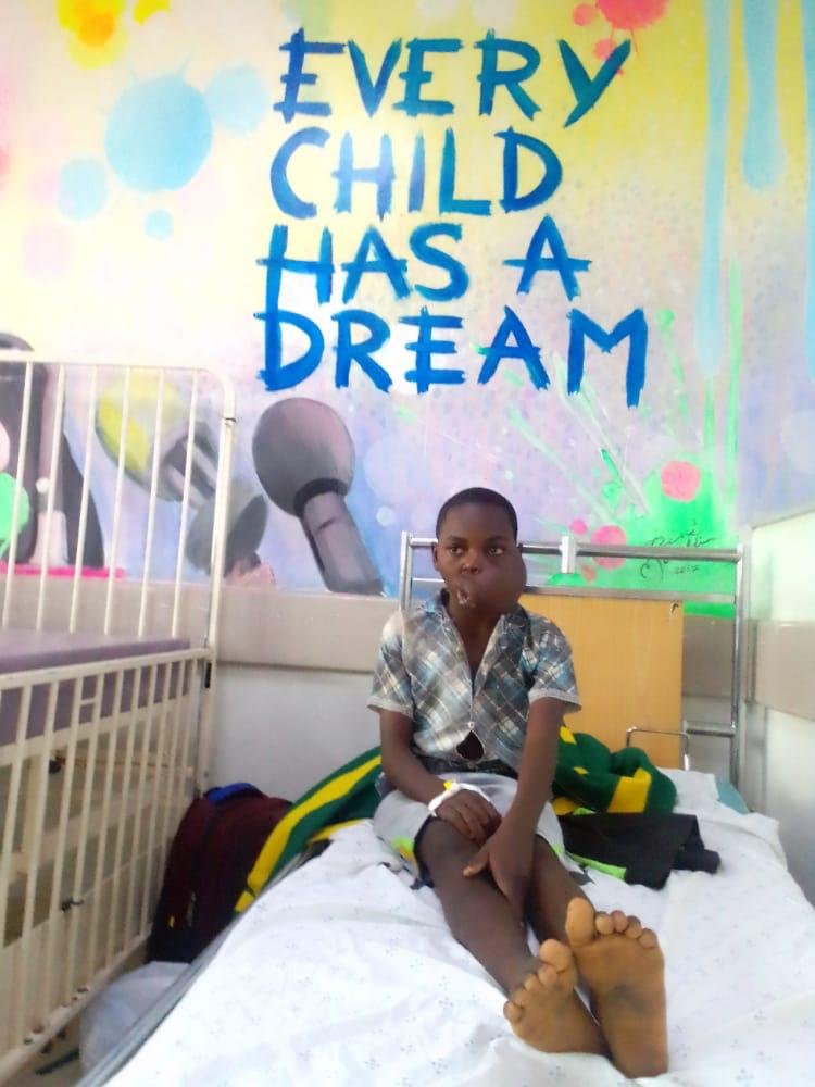 Mphatso in his hospital bed at Mercy James Institute in Blantyre.