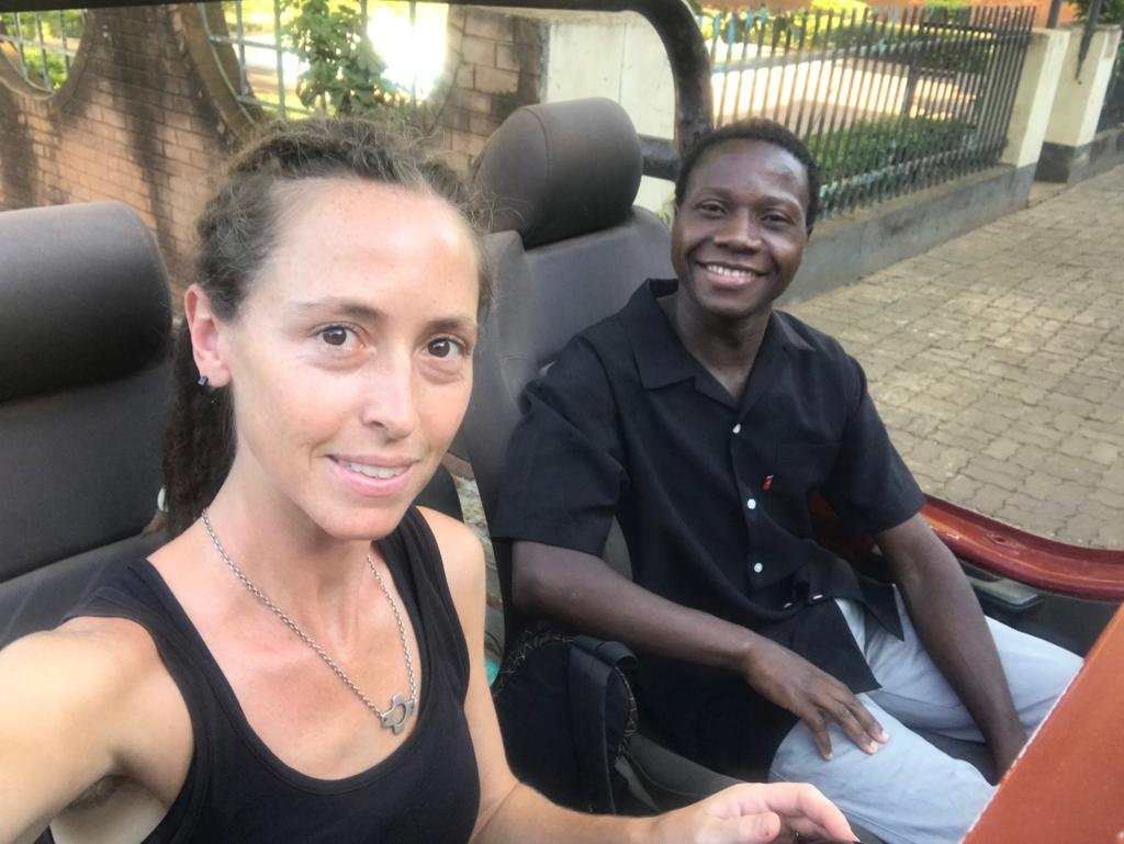  Global Health Fellow Angela and volunteer Jonathan climb into the truck to head out to Kabudula for a local surgical camp. 