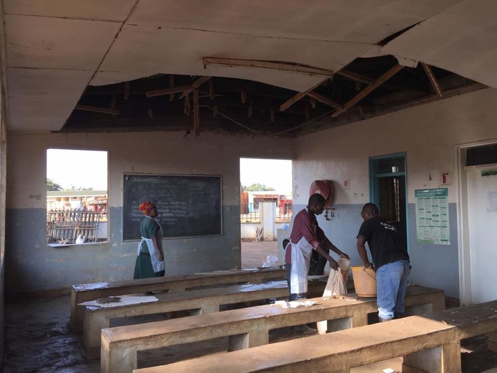  Kabudula Hospital staff cleaning up the mess after the antenatal ward’s ceiling collapsed under the weight of a batt colony. 