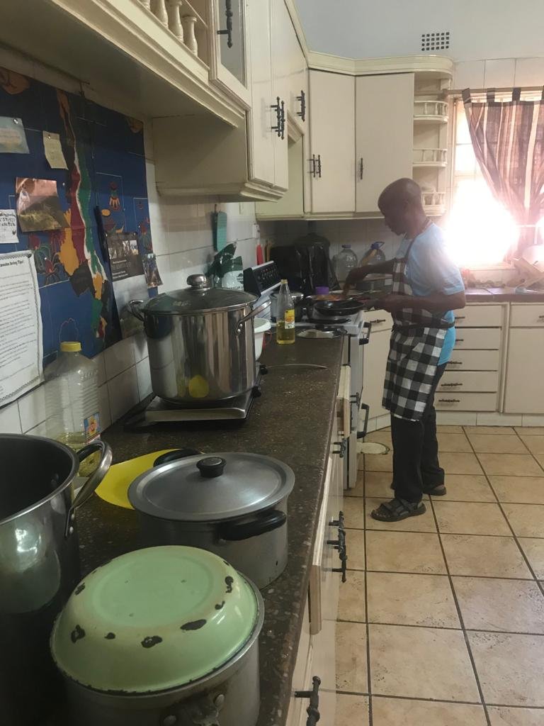  John cooking a delicious dinner at the AHA house. 