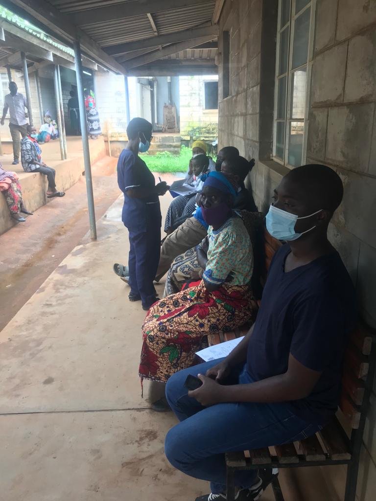 Christina checks patients in at a Kab surgical camp.