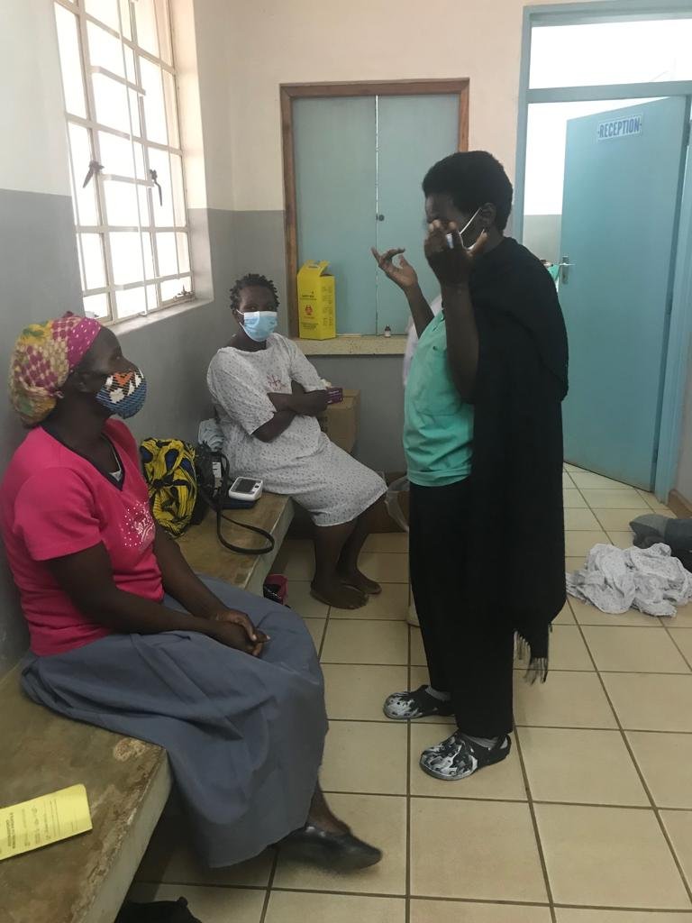 Christina counsels surgical patients in Kab's staging area.