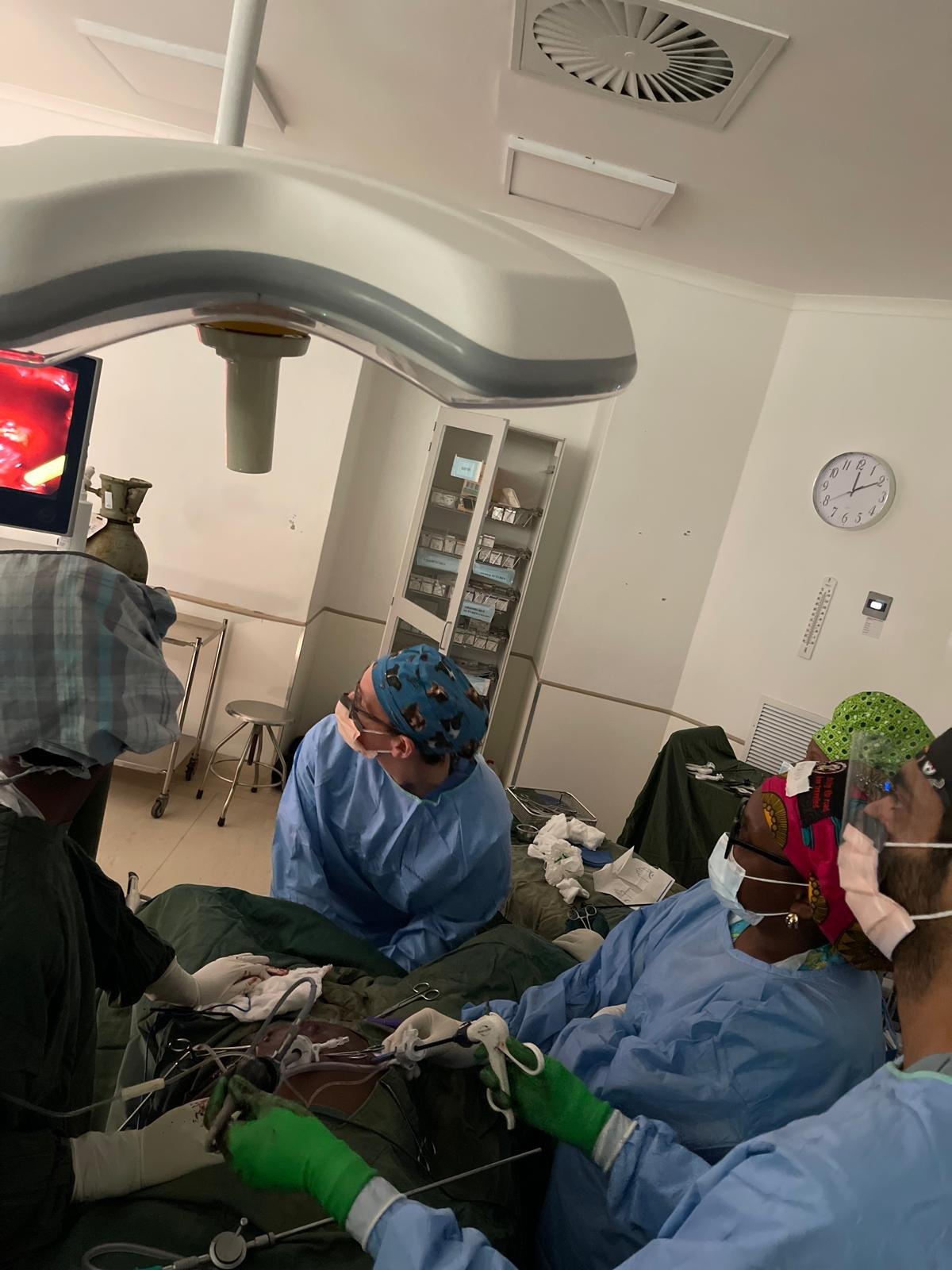 The team uses laparoscopic technology to perform a colostomy reversal surgery.