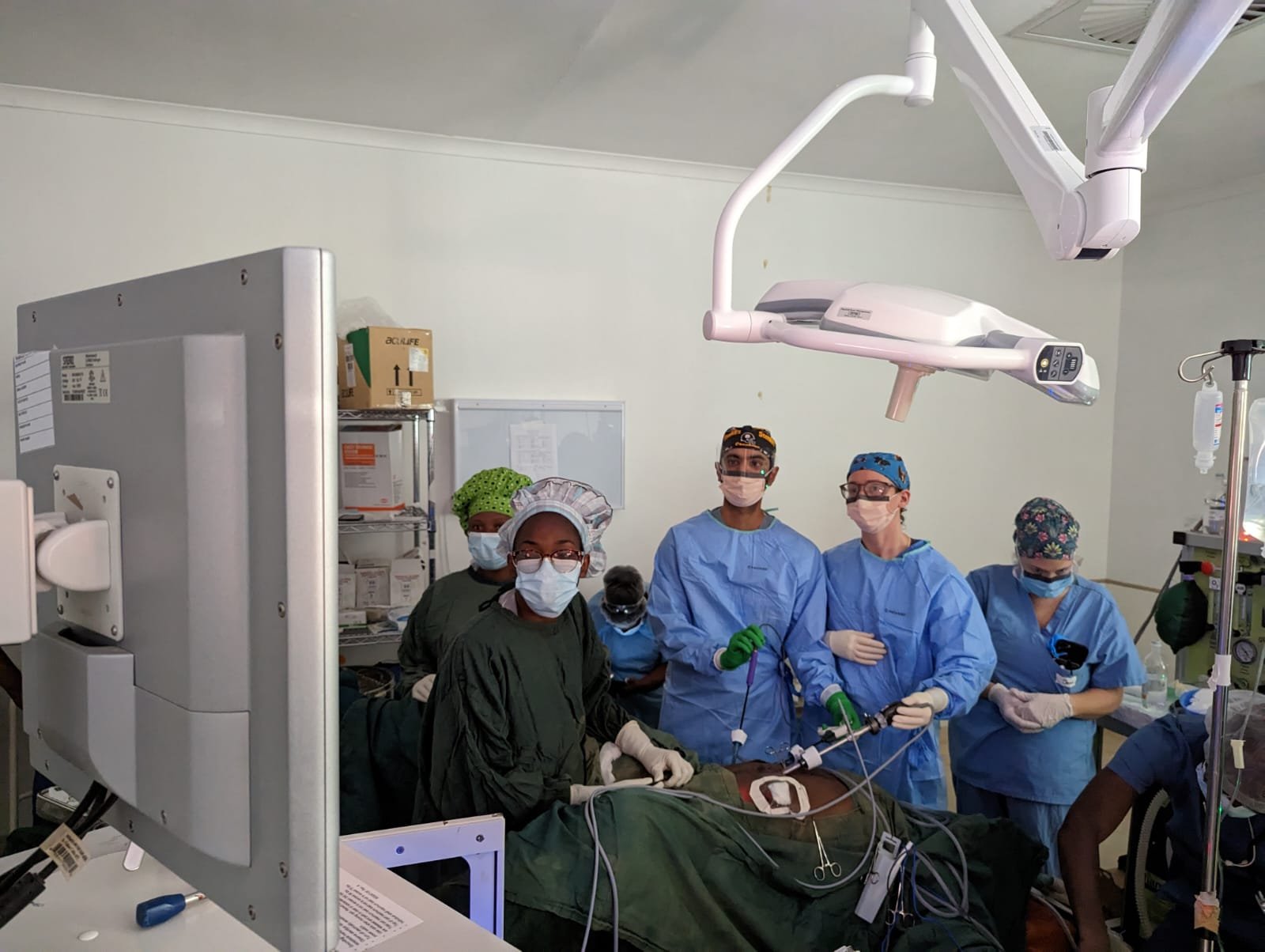 The team uses laparoscopic technology to perform a colostomy reversal surgery.