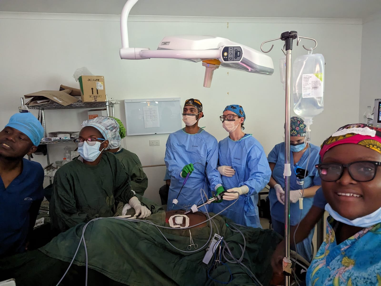 The team uses laparoscopic technology to perform a colostomy reversal surgery.