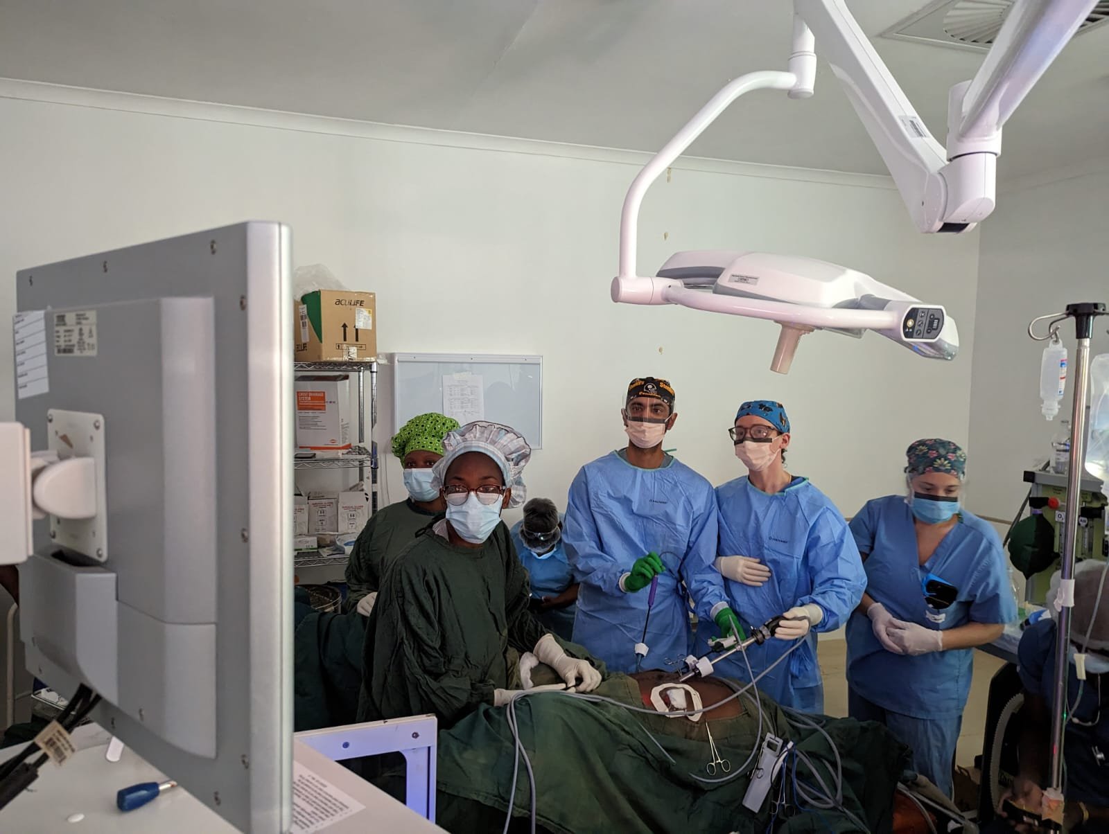 The team uses laparoscopic technology to perform a colostomy reversal surgery.