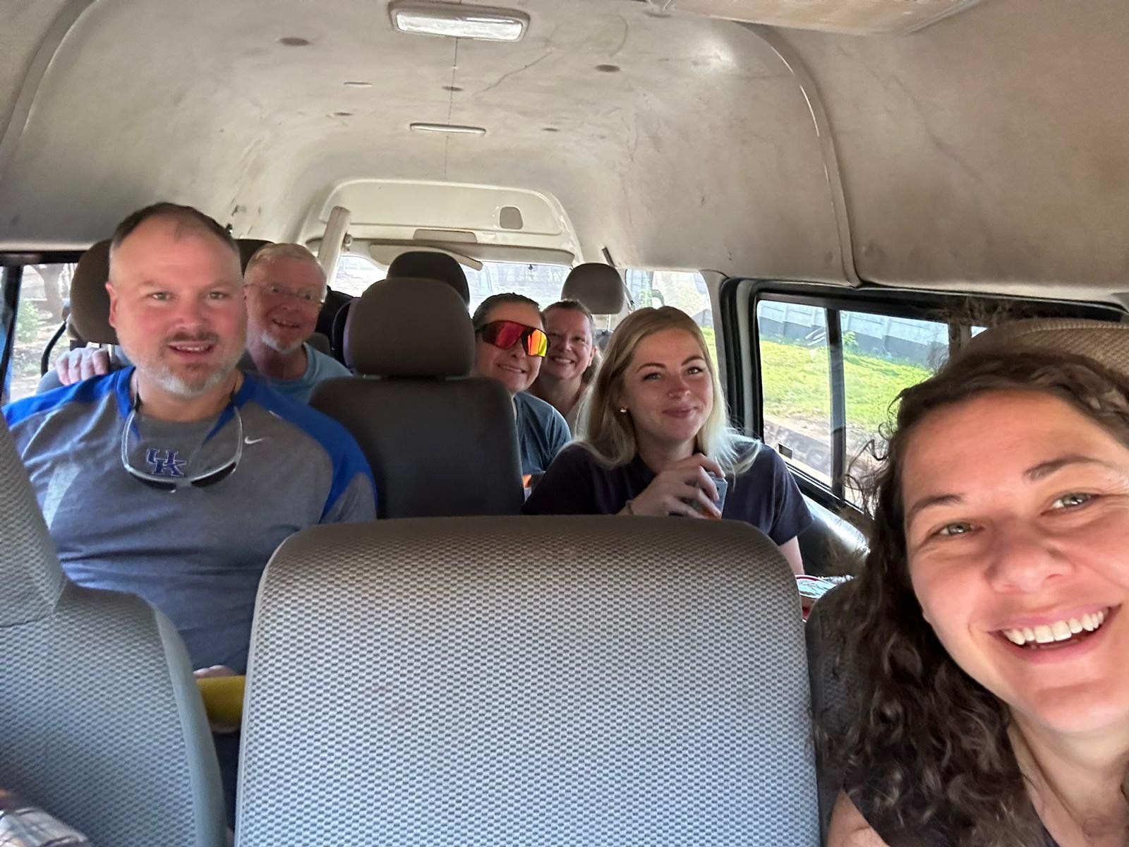 Ari, second from right, in the van on the way to Day 1 at Mitundu!