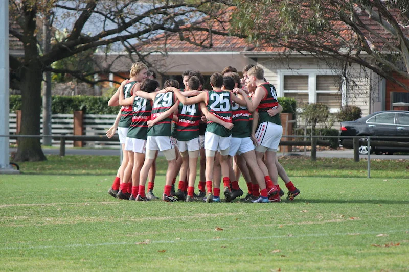 Ashburton Meats gather in during Round 8. Despite some big names out and low numbers, these boys rallied for another ripping win.