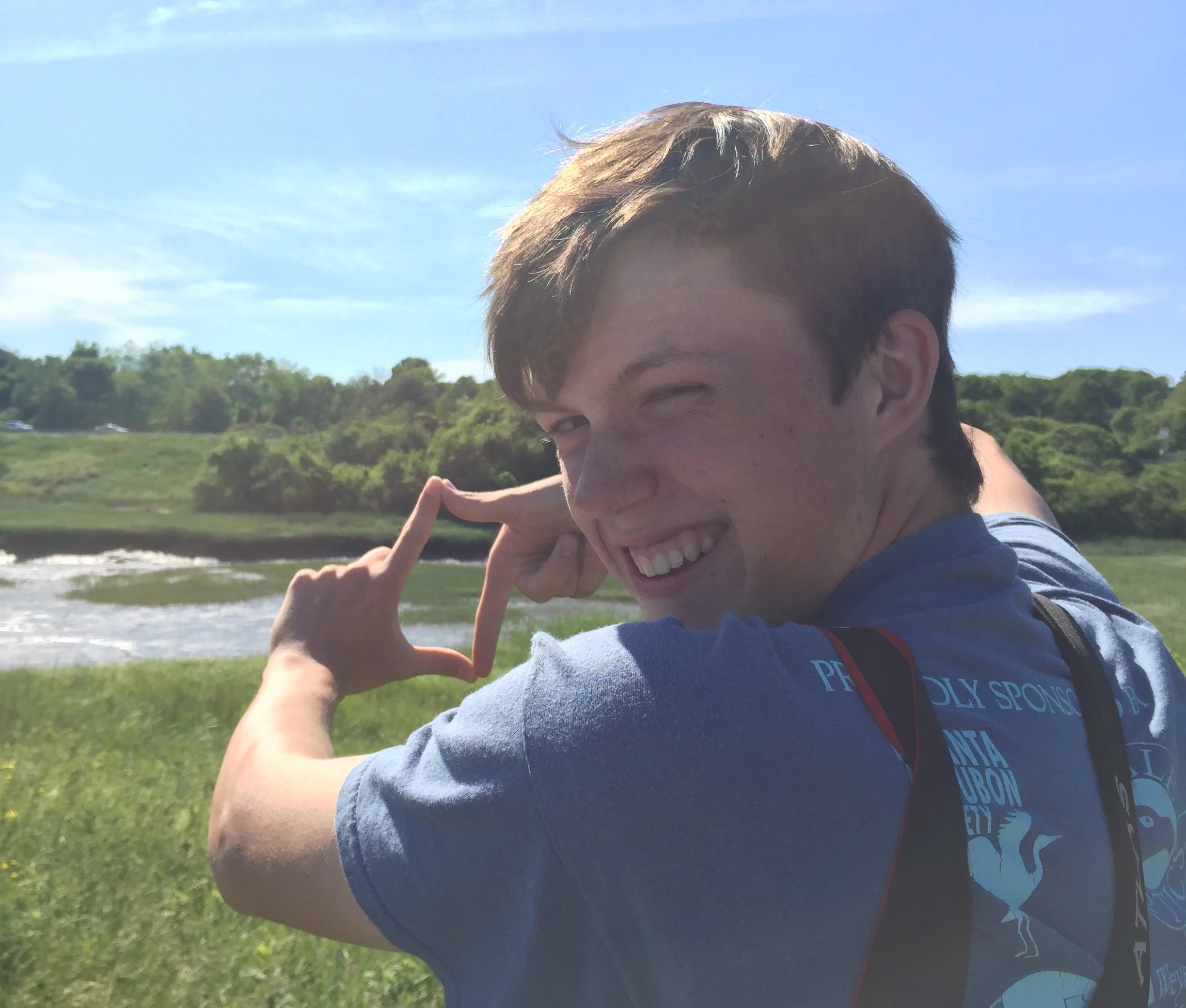 Angus frames the Little Egret in Maine (bird is to the left of his hands) 