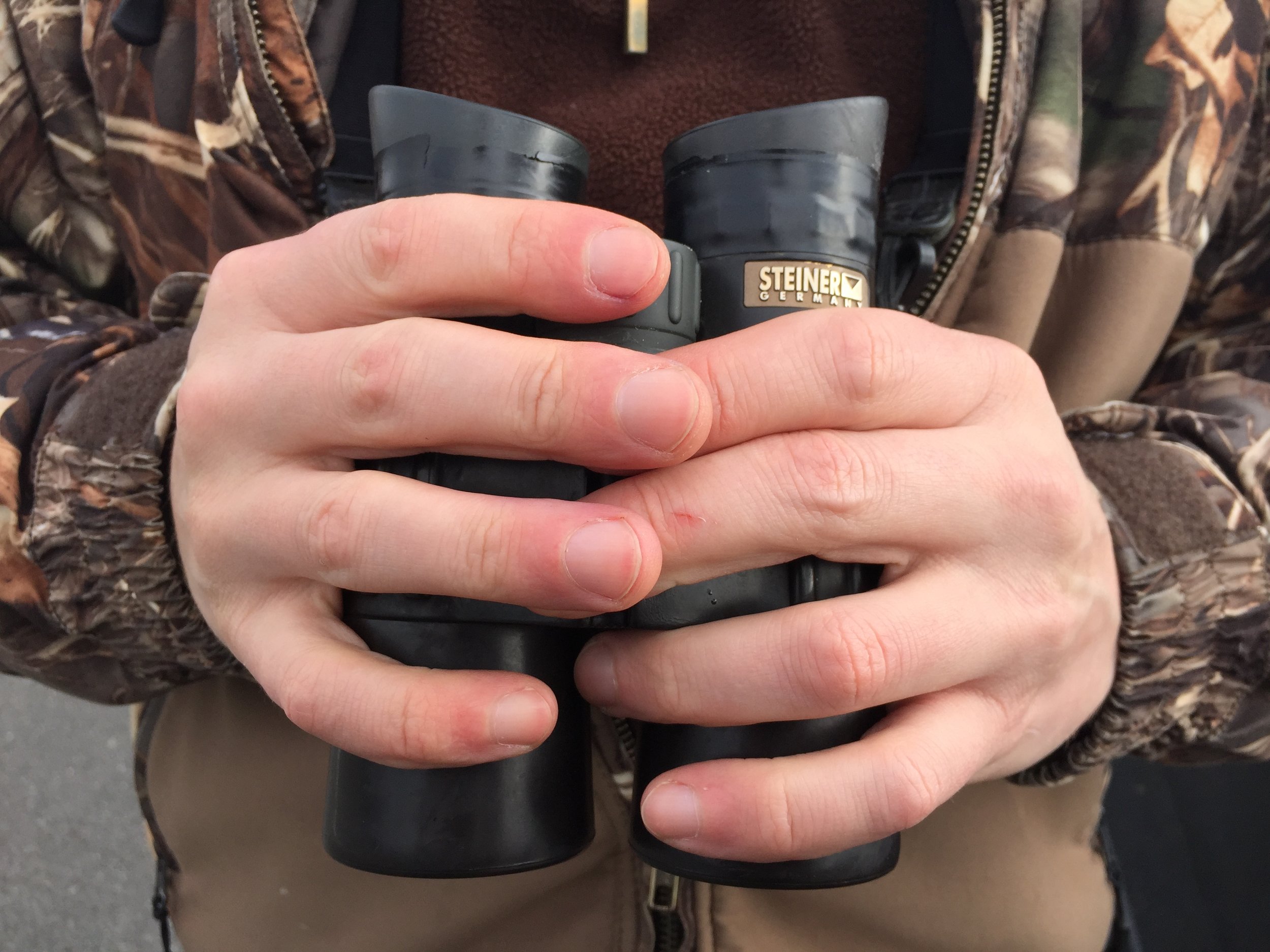 Isaac's binoculars have seen some serious use, bringing hundreds of different species of Alaskan birds into focus