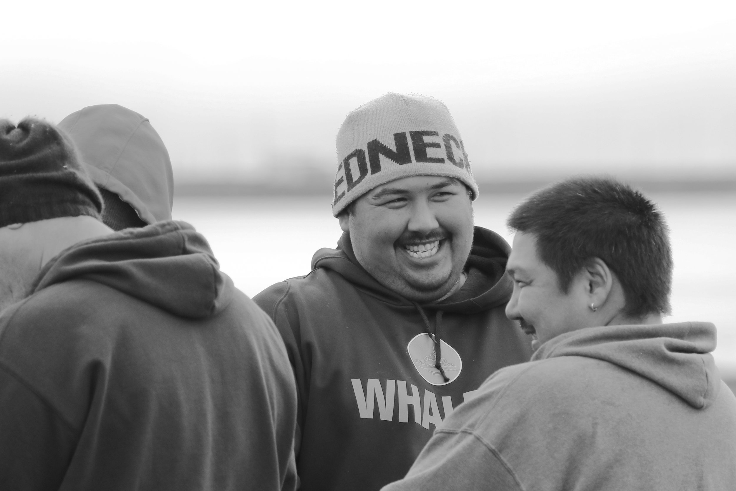 Bringing in a whale is an accomplishment celebrated by the entire community, and neighbors and family happily share the work together. 