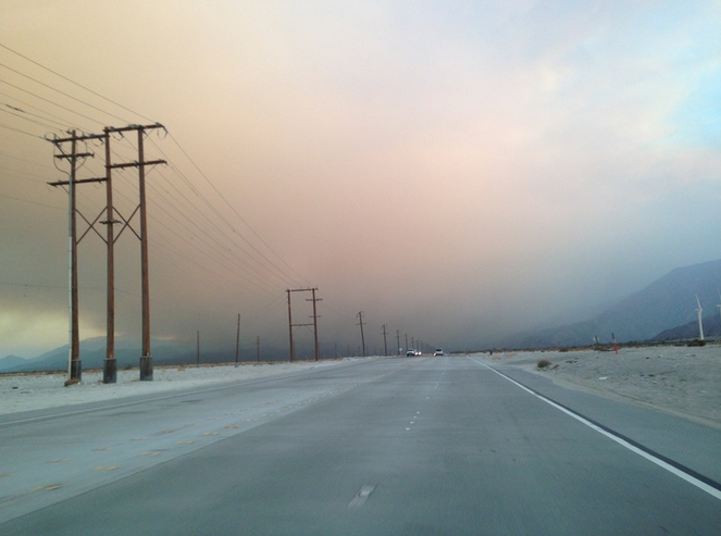 Nearby forest fires create smoky skies.