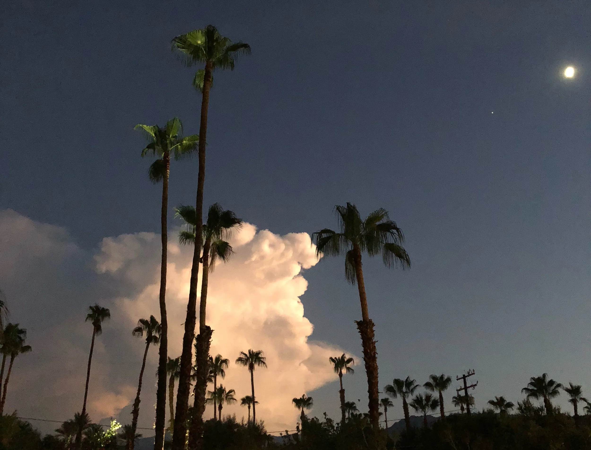 Evening thunderstorms created a light show as lightning lit up the skies. The storm was over and south of the Santa Rosa Mountains, creating over 2 inches of rain in remote sections of the nearby deserts.
