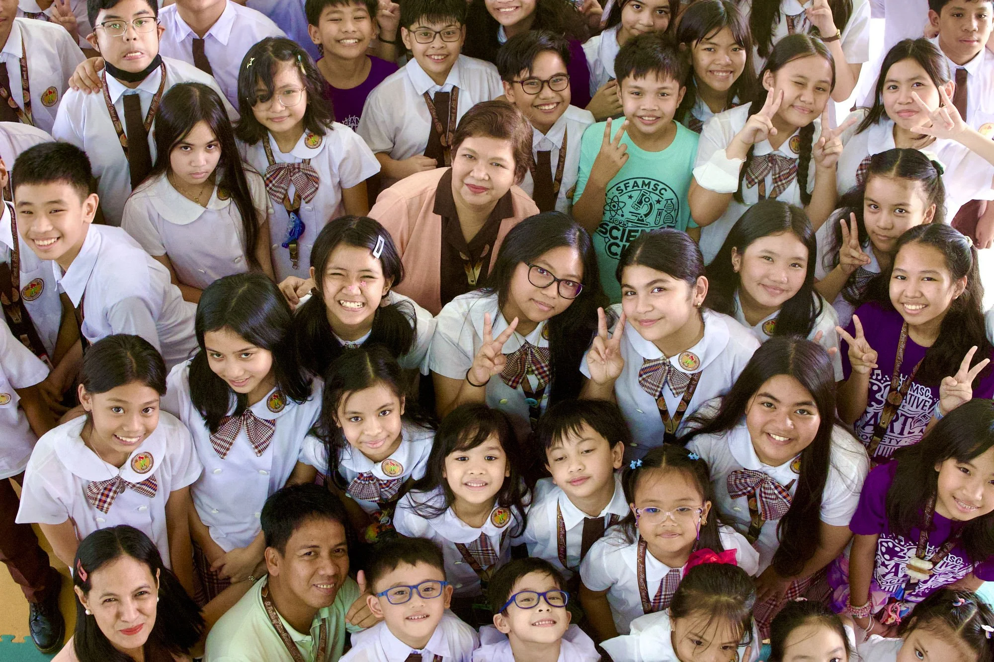 St. Francis Cainta Students smiling Rizal.jpg