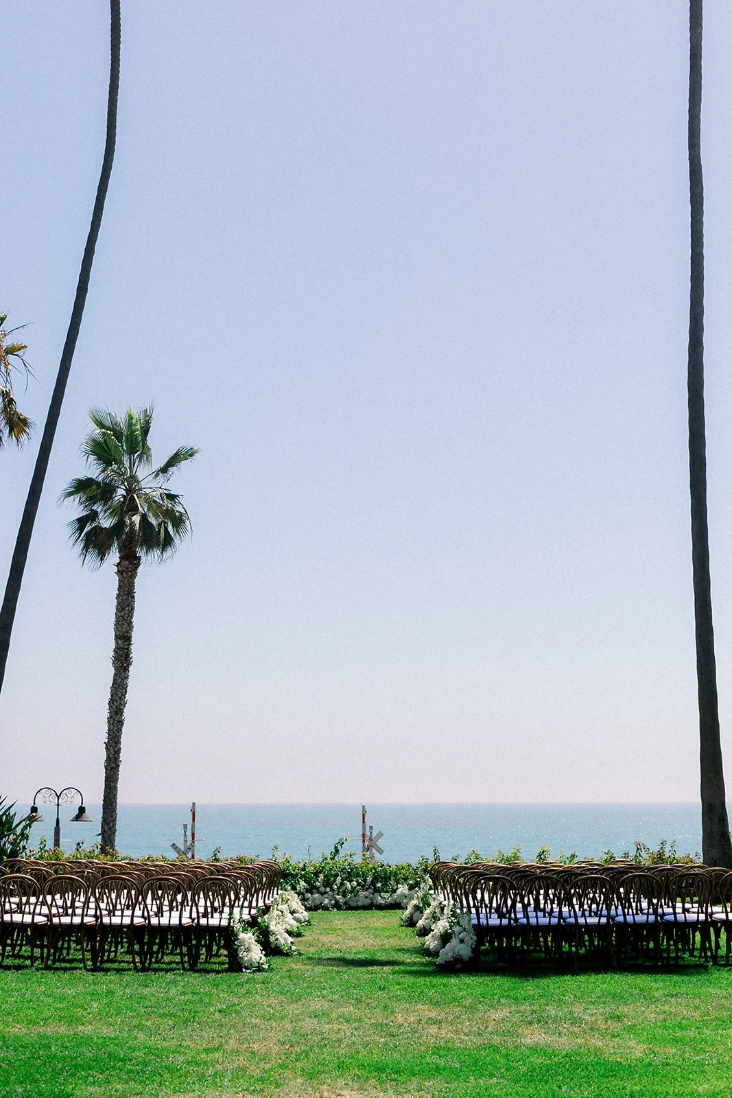Outdoor wedding ceremony at Ole Hanson Beach Club in San Clemente, California
