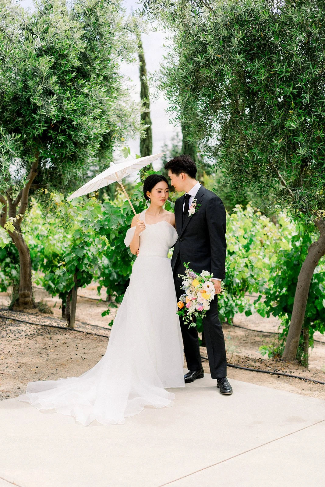 Romantic couple portraits at Mount Palomar Winery with rolling vineyard scenery