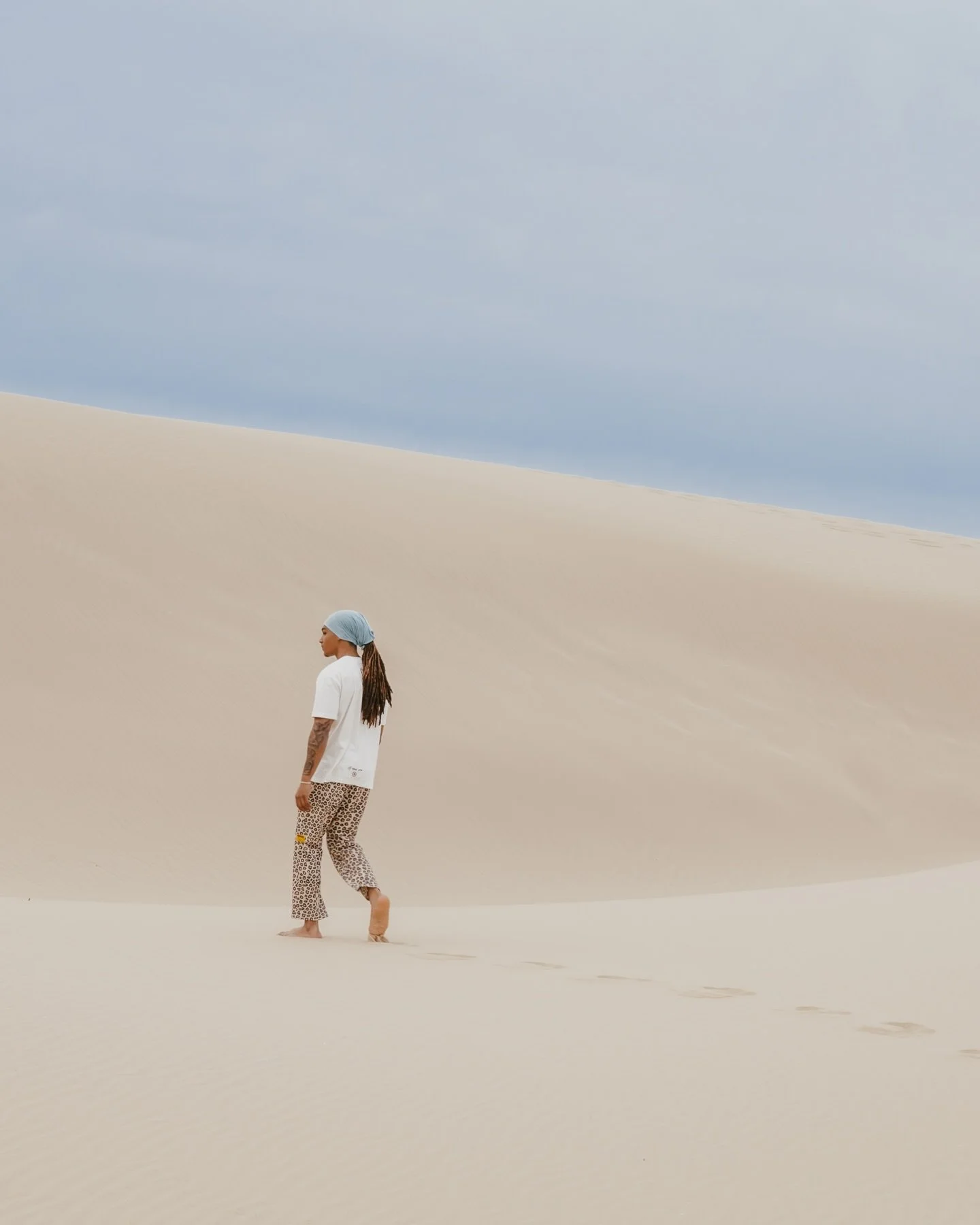 @jaynoclout wearing @amorefashionfl somewhere in dunes.
.
#photography #desert #fashionphotography